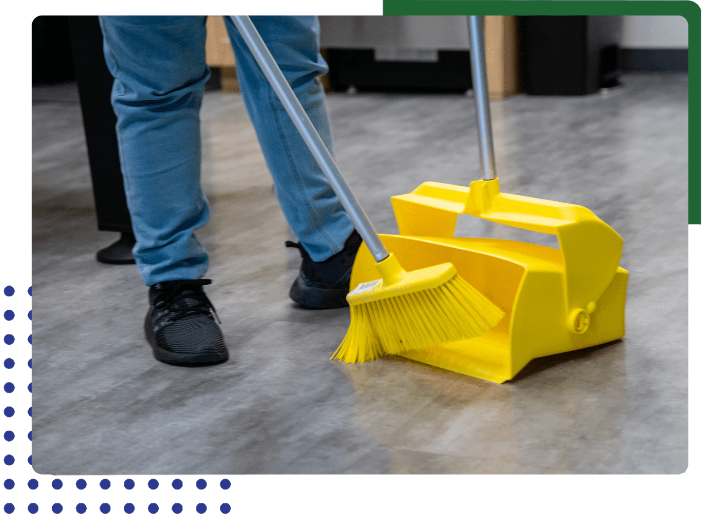 A person sweeping the floor with a broom